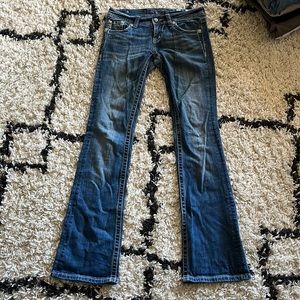 Miss Me peace signs on back pockets